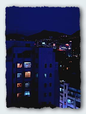 Appartment house at night in Hong Kong