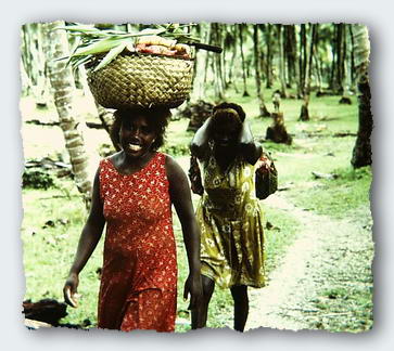 The women walk to their gardens each day, often as much as a mile from the village. 