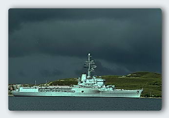 French Warship in Noumea with storm clouds gathering. 