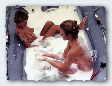 A girl sunday as Freddy and Patty bubble up in the rubber tub.