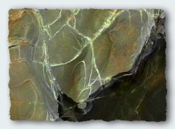 Patterns of stresses laid down within the rock when it was formed.
